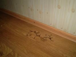 Изолирайте на пода в една дървена къща